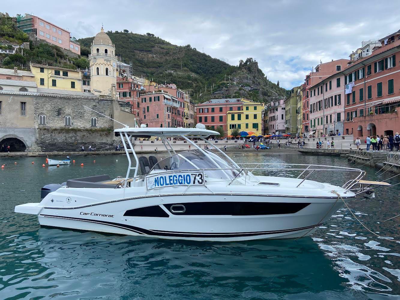 cinque terre boat in the port of vernazza