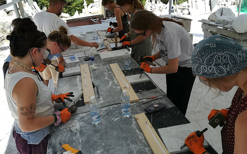 carrara marble workshop, sculptors at work
