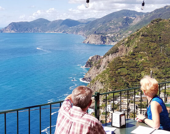 Cinque Terre coastline seen from the sea during a shore excursion from La Spezia