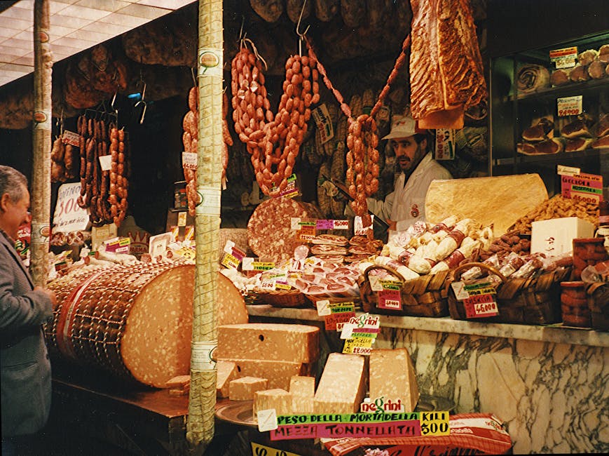 Traditional Italian deli counter in Florence showcasing meats and cheeses.